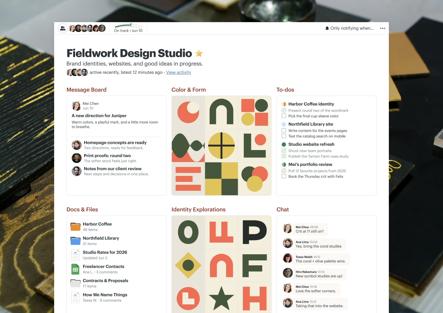 A design agency client work project in Basecamp with Docs & Files, a Message Board, To-dos, a Calendar, and Chat